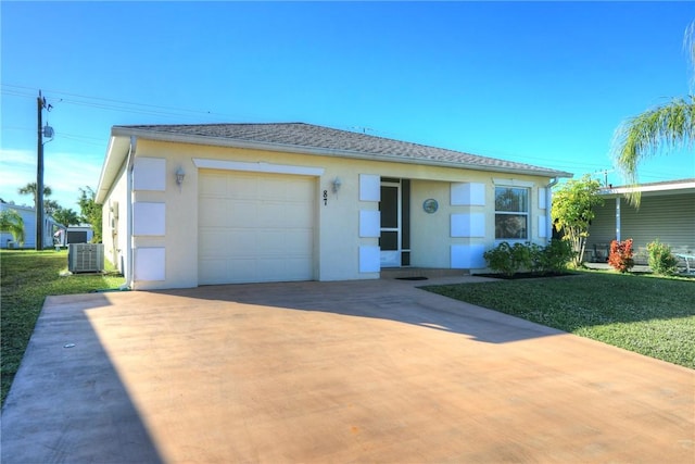 ranch-style house with cooling unit and a front yard