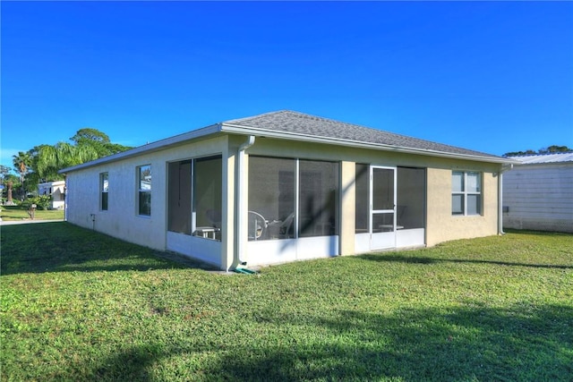 view of side of home featuring a lawn