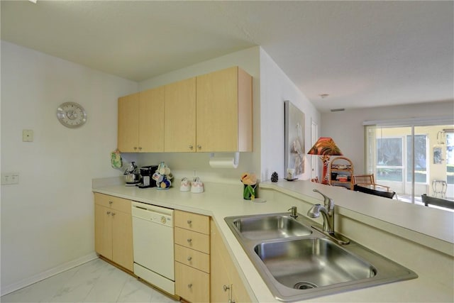 kitchen with dishwasher, light brown cabinets, kitchen peninsula, and sink