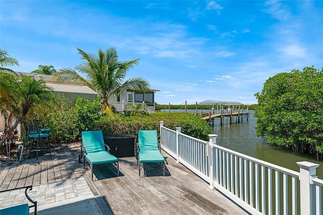 5367 Montego Cir, Hutchinson Island, FL 34949 - deck featuring a water view and a dock