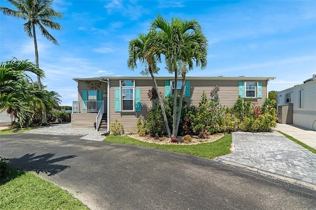 5367 Montego Cir, Hutchinson Island, FL 34949 - manufactured / mobile home featuring stairway