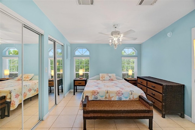 5367 Montego Cir, Hutchinson Island, FL 34949 - bedroom featuring light tile patterned floors, baseboards, ceiling fan, and access to outside