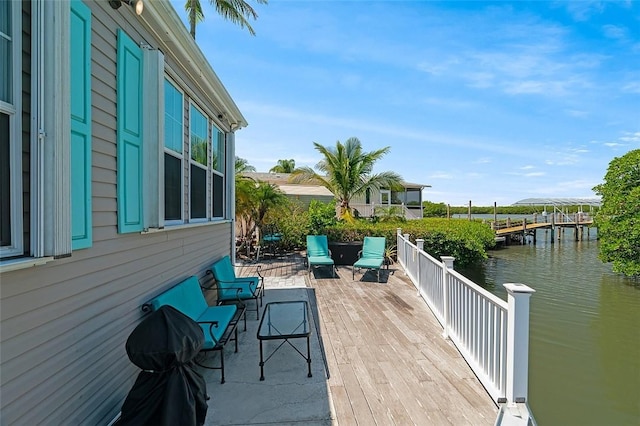 5367 Montego Cir, Hutchinson Island, FL 34949 - wooden deck featuring a water view