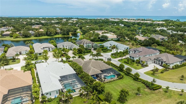 drone / aerial view featuring a water view