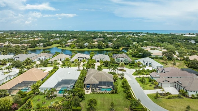 bird's eye view with a water view