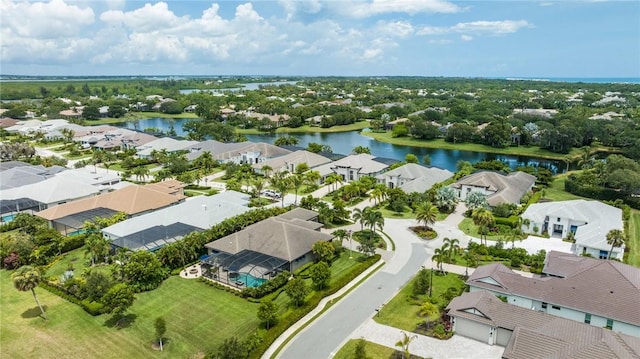 drone / aerial view with a water view