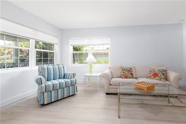 sitting room featuring light wood-type flooring