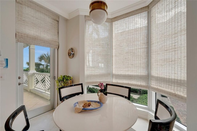 dining room with crown molding