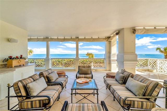 view of patio featuring an outdoor living space and a water view