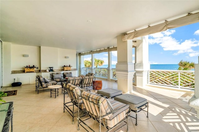 view of patio / terrace featuring outdoor lounge area and a water view