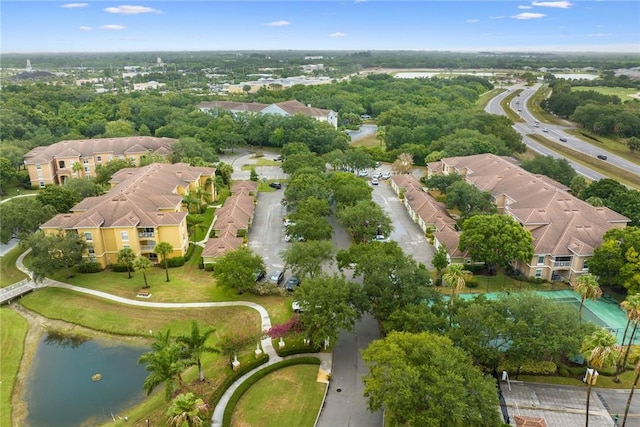 5095 Fairways Cir Unit I304, Vero Beach, FL 32967 - aerial perspective of suburban area with a large body of water and a tree filled landscape