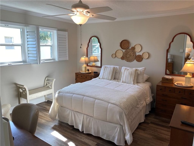 bedroom featuring ceiling fan, ornamental molding, and dark wood-type flooring