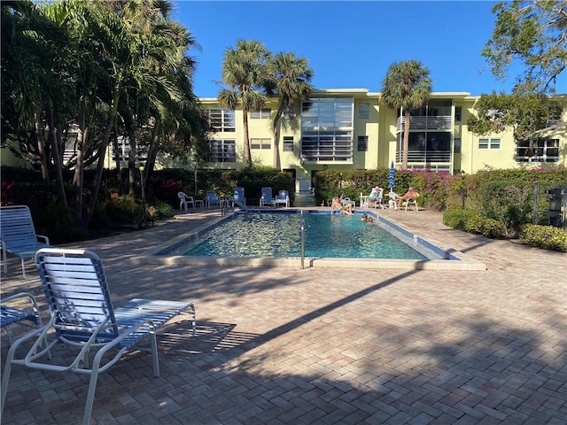 view of swimming pool with a patio area