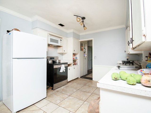 kitchen featuring white appliances, white cabinetry, light tile patterned floors, and crown molding