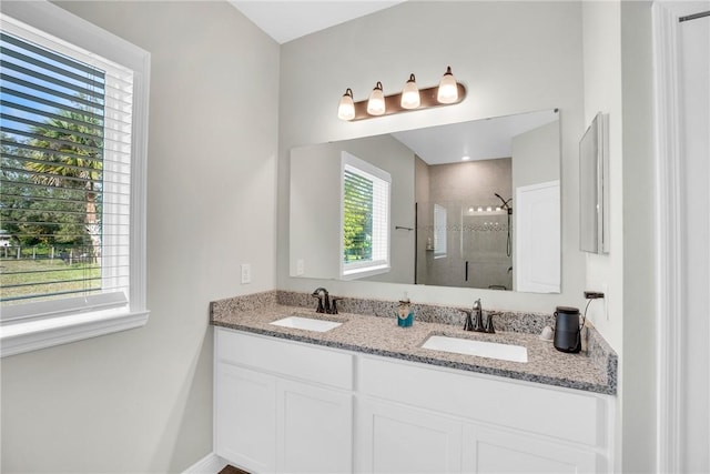 bathroom featuring vanity and walk in shower