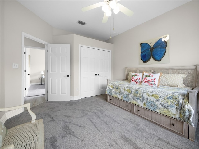 bedroom with ceiling fan, a closet, and carpet floors