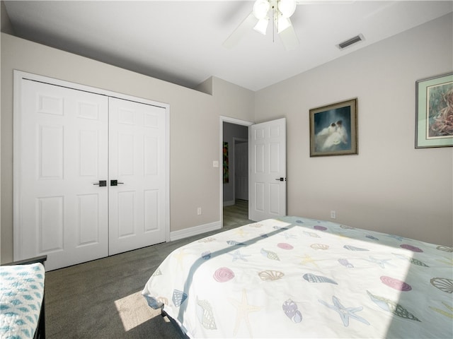 bedroom with carpet, ceiling fan, and a closet