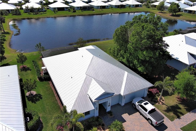aerial view with a residential view and a water view