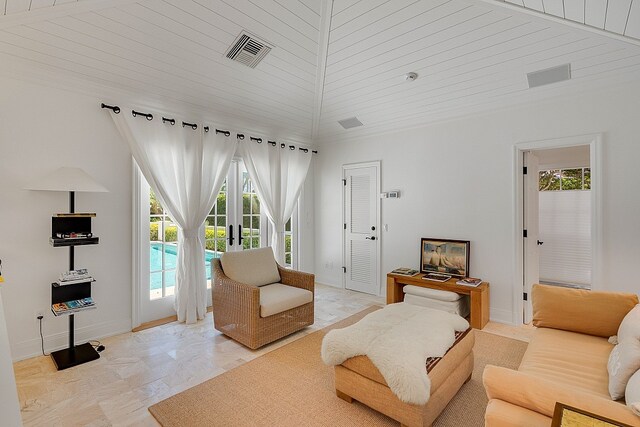 living room featuring high vaulted ceiling, a wealth of natural light, wood ceiling, and french doors