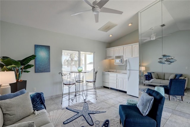 tiled living room featuring vaulted ceiling and ceiling fan