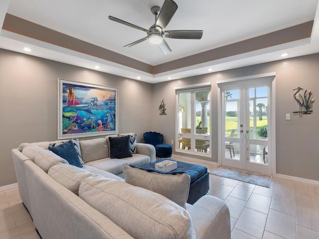 living area featuring french doors, recessed lighting, a ceiling fan, and baseboards