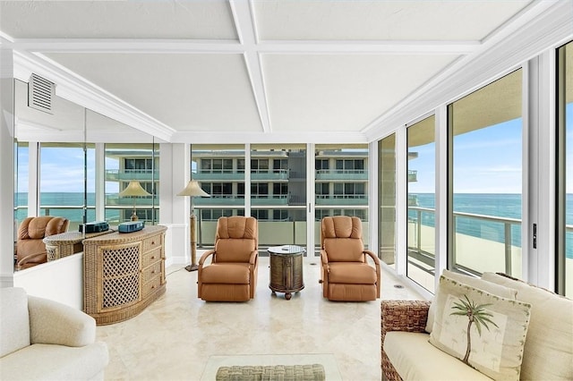 3554 S Ocean Dr Unit 1203, Vero Beach, FL 32963 - sunroom featuring expansive windows, a water view, coffered ceiling, beamed ceiling, and crown molding