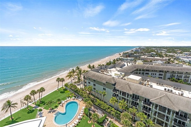 3554 S Ocean Dr Unit 1203, Vero Beach, FL 32963 - drone / aerial view of waterfront with a beach and a pool
