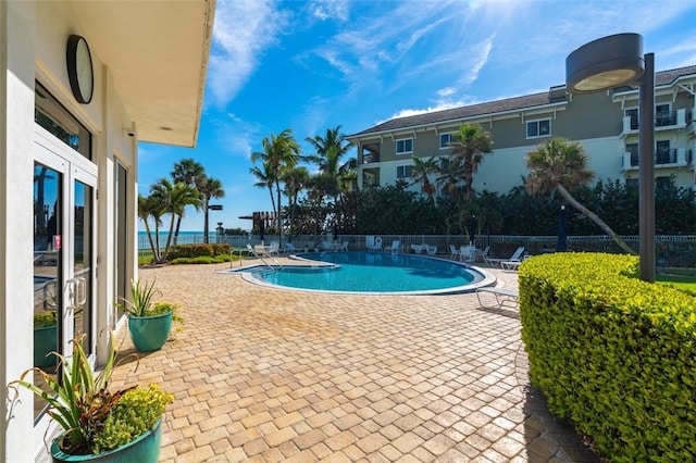 3554 S Ocean Dr Unit 1203, Vero Beach, FL 32963 - community pool featuring a patio area