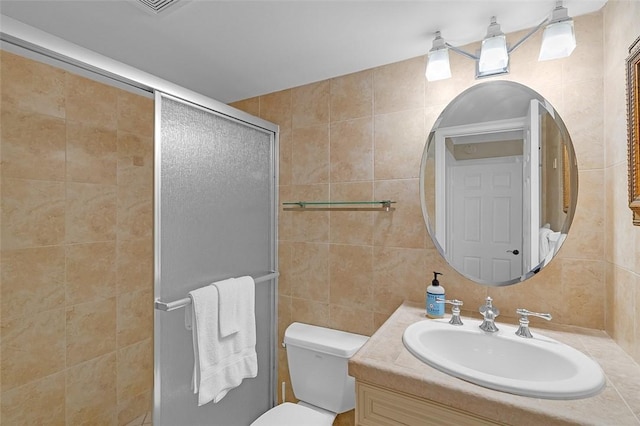3554 S Ocean Dr Unit 1203, Vero Beach, FL 32963 - full bathroom with a stall shower, tile walls, and vanity