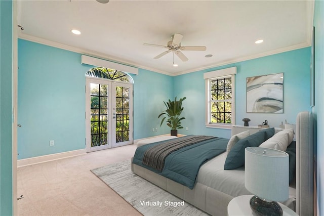 carpeted bedroom with access to exterior, french doors, baseboards, and ornamental molding