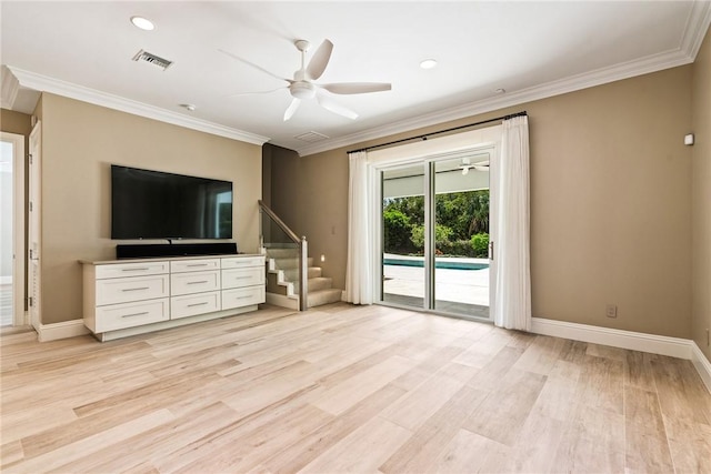 unfurnished living room with visible vents, baseboards, crown molding, and light wood-style floors