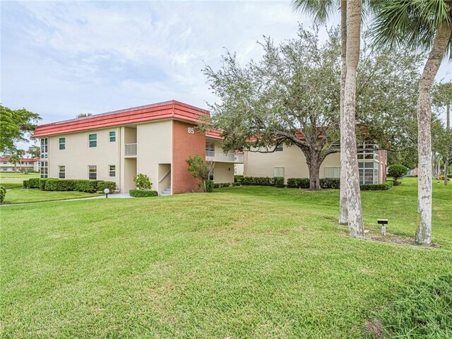 85 Crooked Tree Ln Unit 203, Vero Beach, FL 32962 - view of building exterior