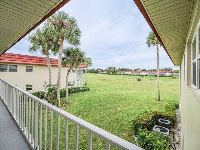 85 Crooked Tree Ln Unit 203, Vero Beach, FL 32962 - view of yard with a balcony