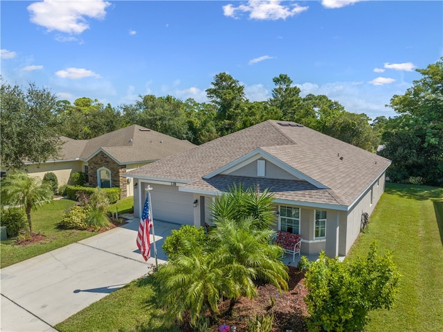 ranch-style home featuring a garage and a front yard