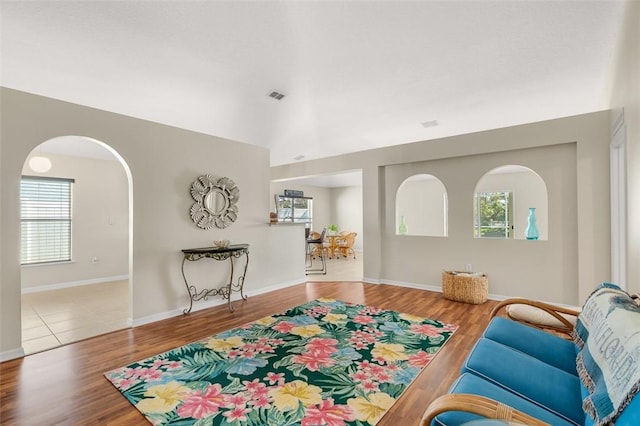 interior space with plenty of natural light and wood-type flooring