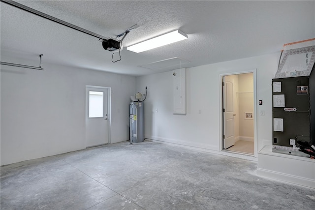 garage featuring electric water heater and a garage door opener