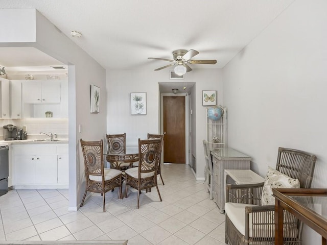 2800 Indian River Blvd Unit N2, Vero Beach, FL 32960 - dining area featuring a ceiling fan, light tile patterned floors, and baseboards