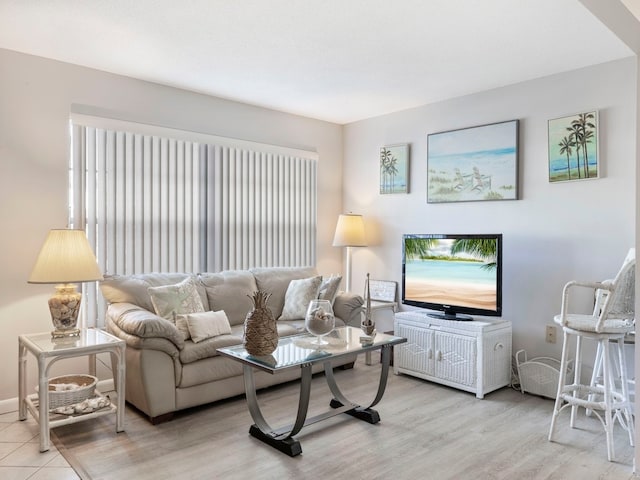 living room with light hardwood / wood-style flooring