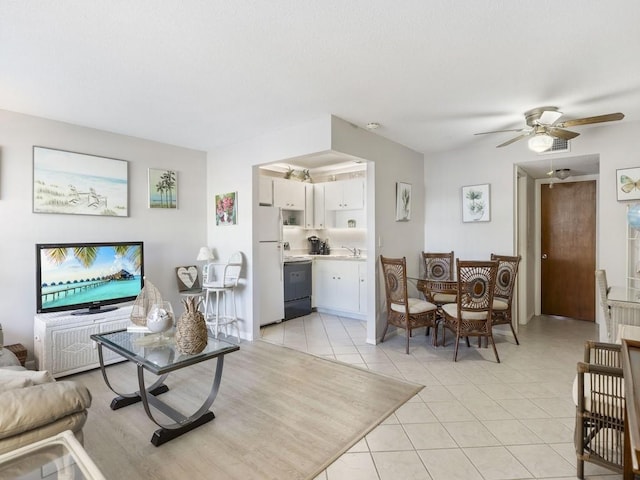 2800 Indian River Blvd Unit N2, Vero Beach, FL 32960 - living area featuring light tile patterned flooring and a ceiling fan