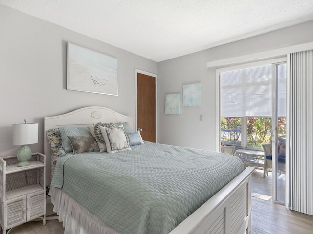 2800 Indian River Blvd Unit N2, Vero Beach, FL 32960 - bedroom with access to outside and light wood finished floors