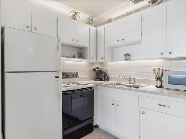 kitchen with white cabinetry, sink, white appliances, decorative backsplash, and light tile patterned flooring