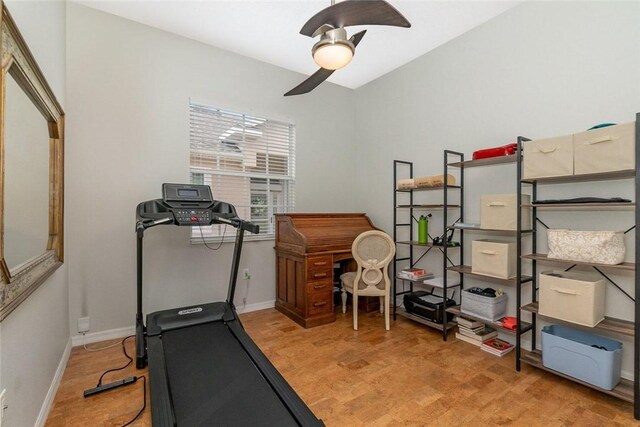 workout room featuring ceiling fan