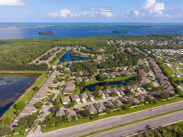 drone / aerial view with a water view