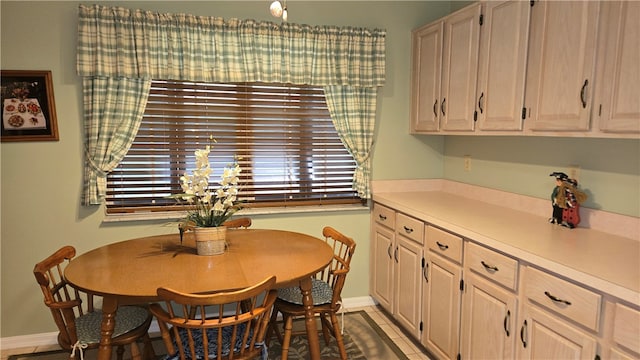 view of tiled dining space