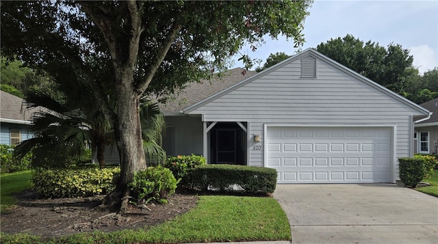 ranch-style home featuring a garage