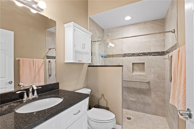 2033 Thistle Dr, Melbourne, FL 32935 - bathroom with vanity, toilet, and tiled shower