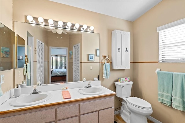 2033 Thistle Dr, Melbourne, FL 32935 - ensuite bathroom with plenty of natural light, a sink, and toilet