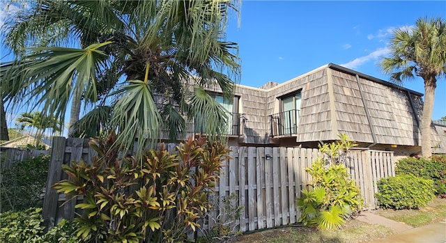 view of home's exterior featuring a balcony