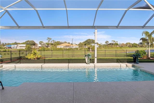 view of pool featuring a lanai, a fenced backyard, a fenced in pool, and a patio