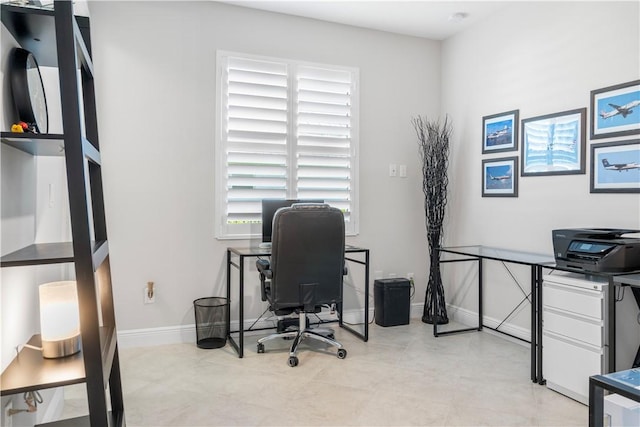 office area featuring baseboards